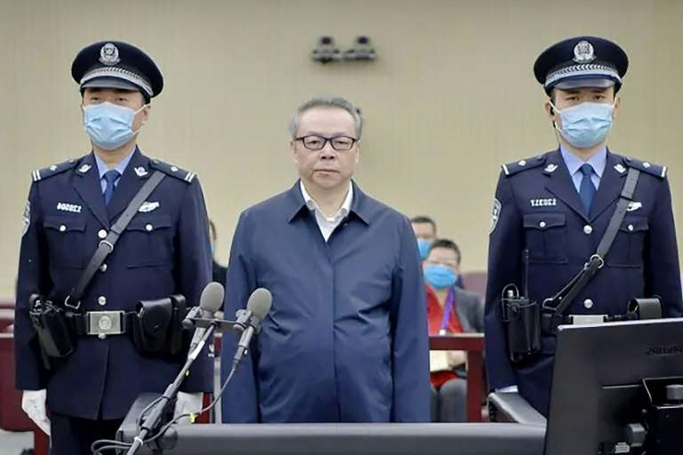 a-person-wearing-a-military-uniform-lai-xiaomin-a-chinese-former-top-banker-shown-here-at-a-hearing-_rapid-news-rapidnews-China-executes-ex-banker-in-bribes-bigamy-case-dailyrapidnews