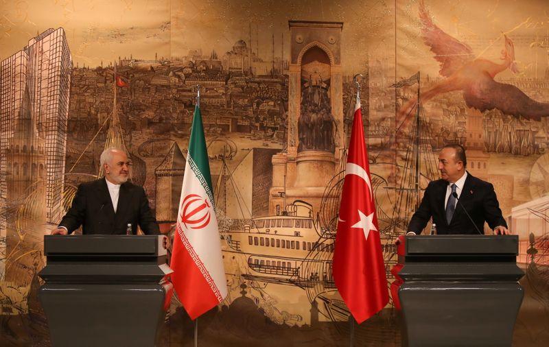 rapidnews-rapid-news-Iranian-Foreign-Minister-with-Turkish-Iran-says-it-will-not-reverse-nuclear-steps-before-US-sanctions-lifted