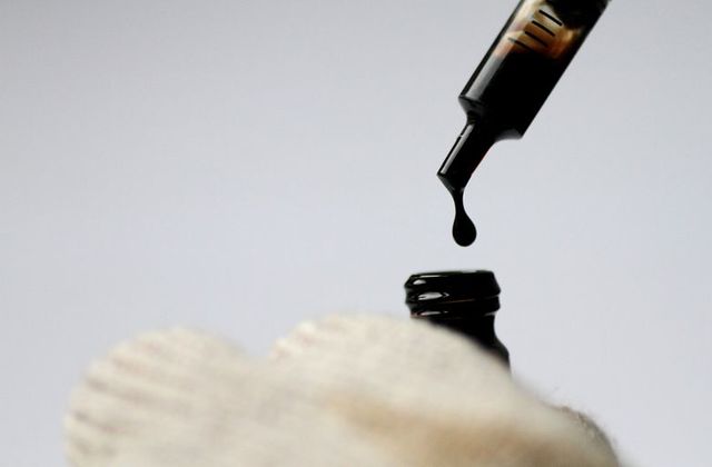 Oil falls as inventories rise, vaccine rollout stalls