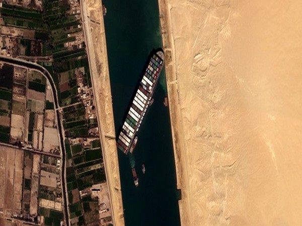 Suez Canal Authority says stranded ship partially refloated