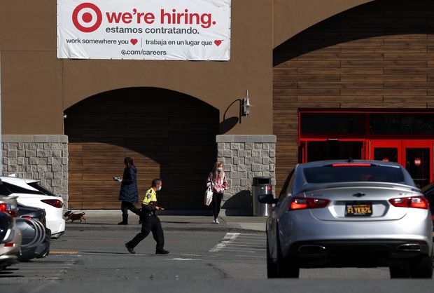 US economy adds 379,000 jobs in February as hiring picks up steam