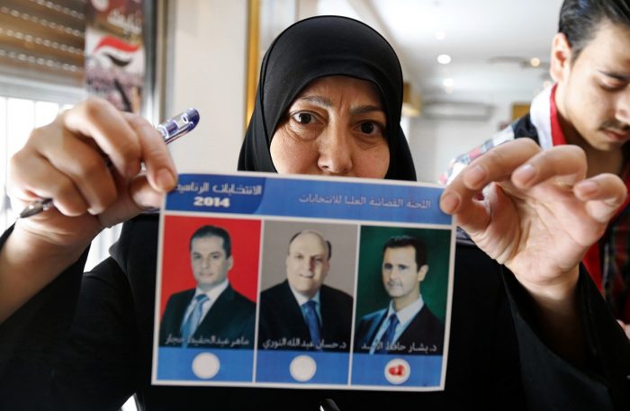 Syrians take to the ballot box as Assad eyes another term as president