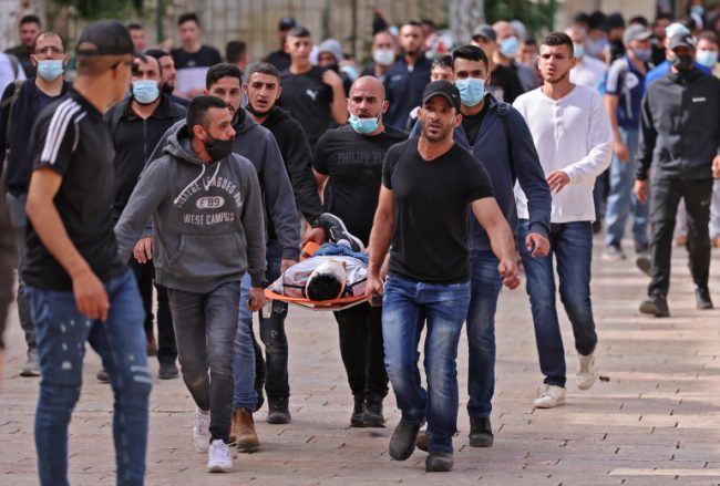 Hundreds wounded as Israeli forces raid Al-Aqsa compound