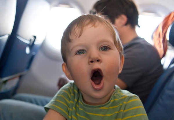 Mum demands stranger entertains her seven-year-old son on flight