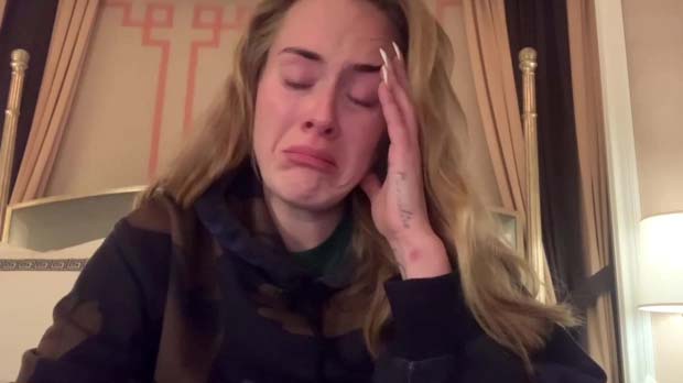 The Brit singer's romance is allegedly on the rocks after time apart put pressure on it. Adele is pictured in tears over her cancelled Las Vegas shows