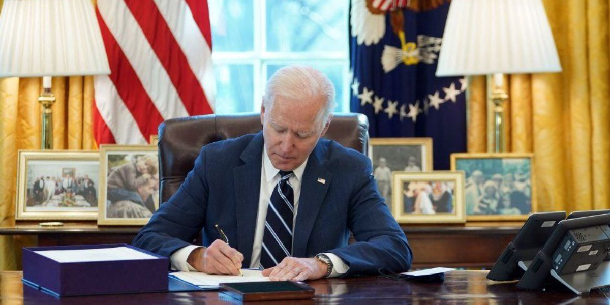 Biden marks the bill.