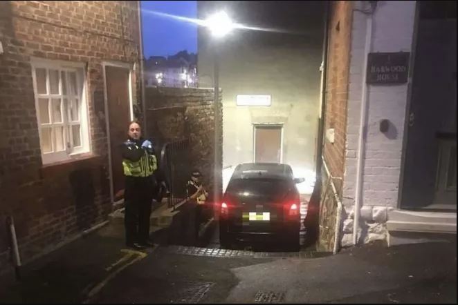 An “idiot” driver parked so improperly that he blocked a front door.